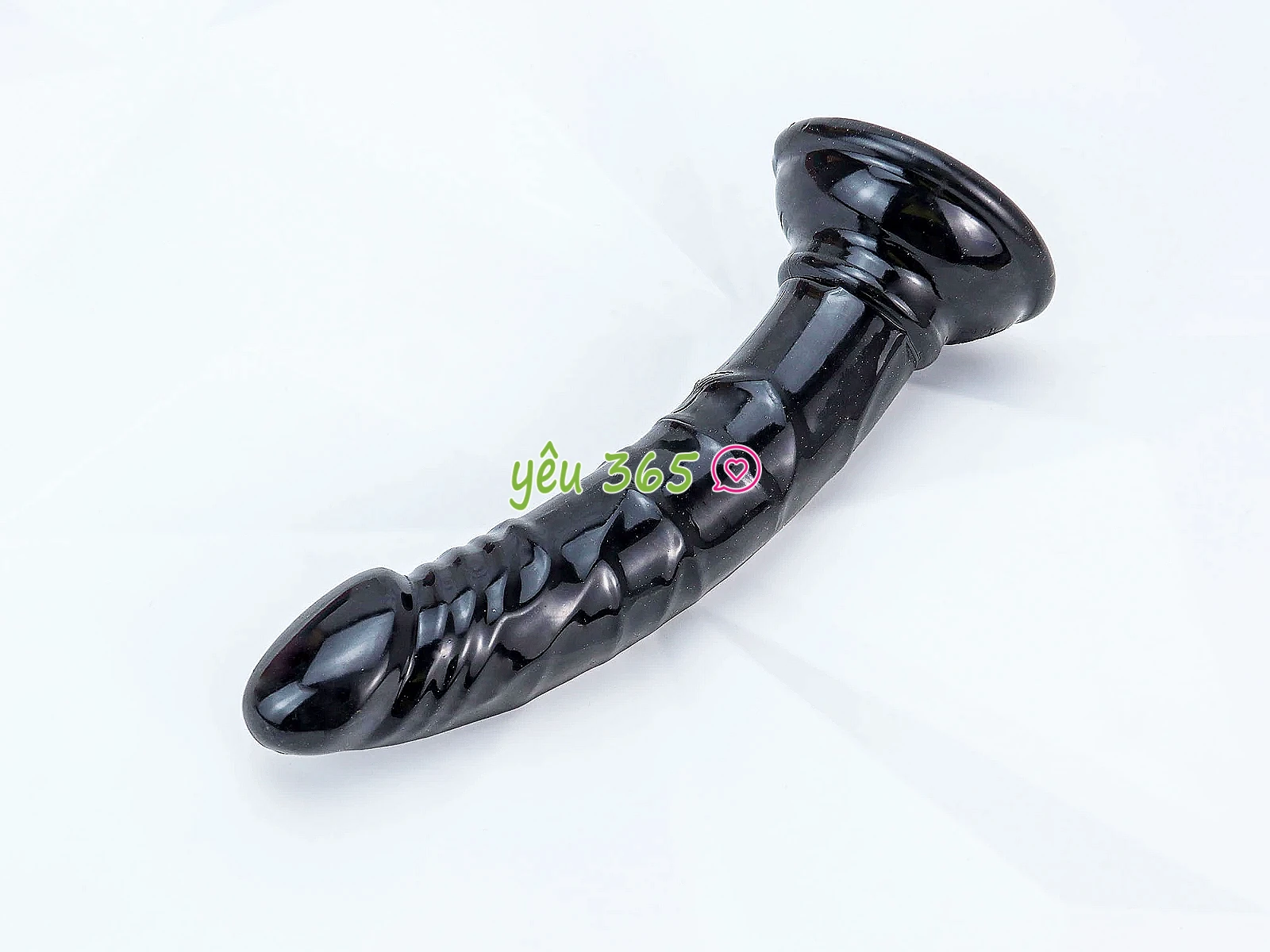 Dương vật giả có đế uốn cong silicon màu đen
