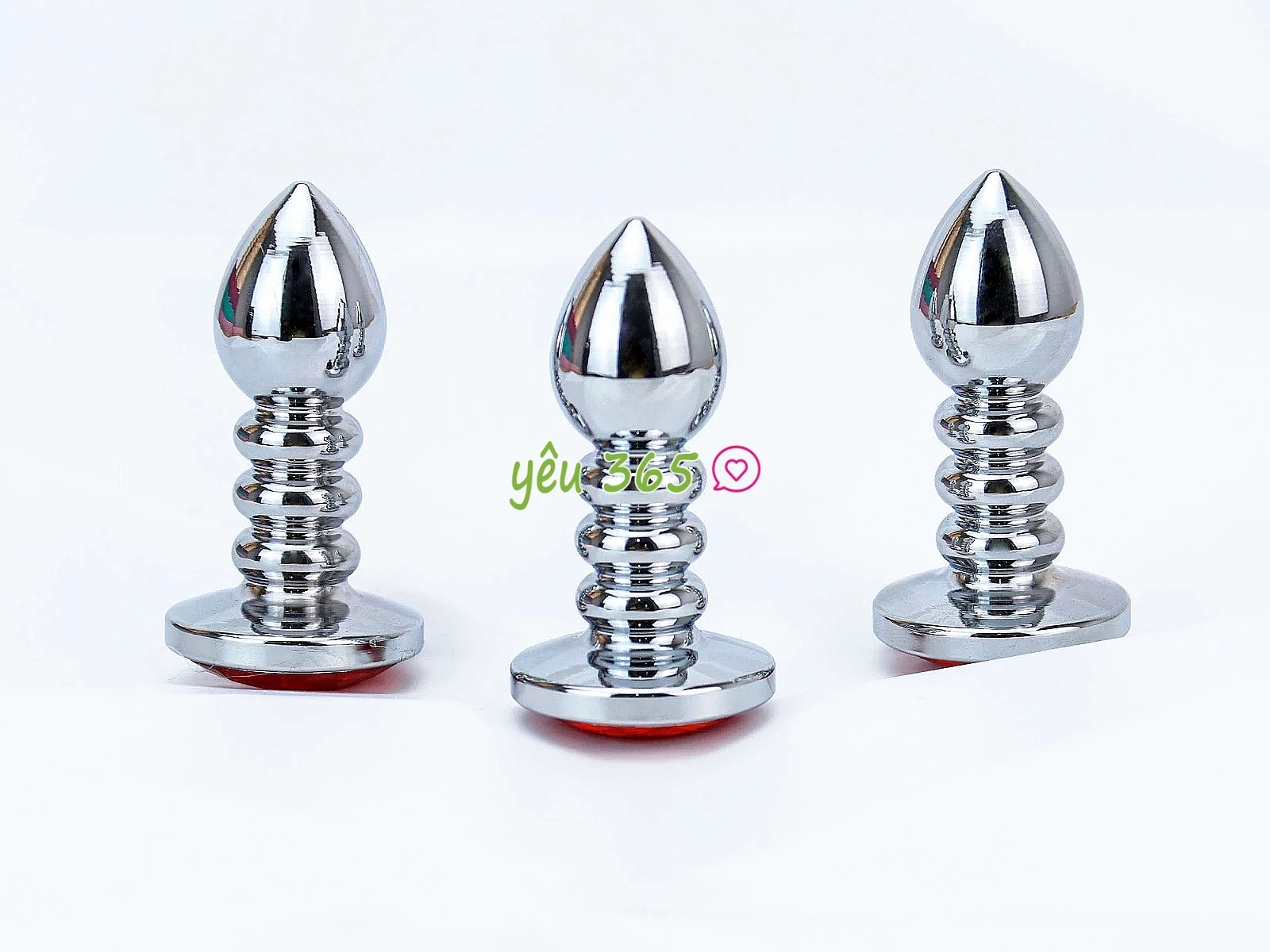 Đồ chơi kích hậu Inox xoắn ốc đuôi pha lê màu cam
